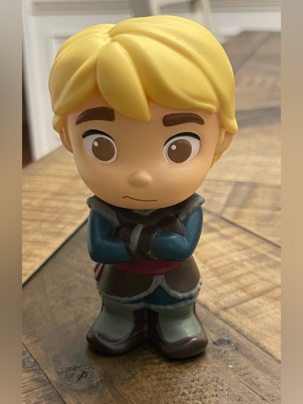 collectible figure depicting Kristoff from Disney's Frozen franchise.